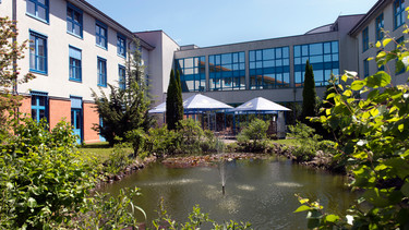 Wyndham Garden Wismar Hotel garden with terrace
